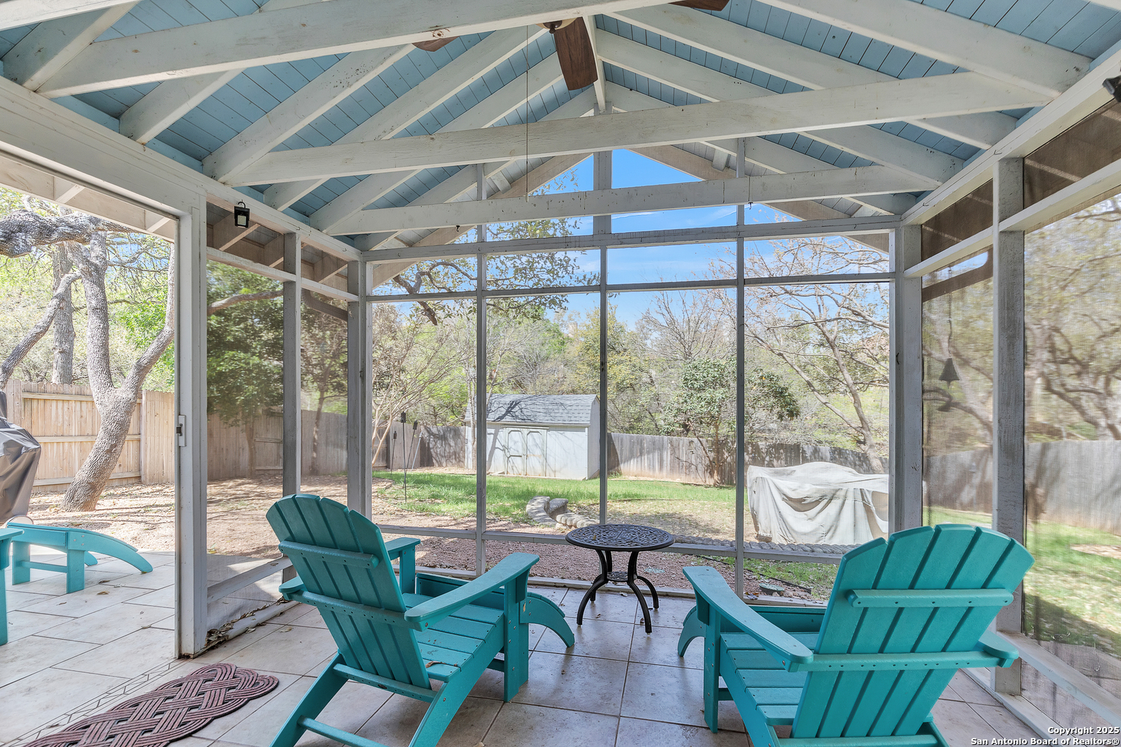1735 Diamond Ridge San Antonio, TX 78248 - Photo 27 of 33 a living room with furniture and a floor to ceiling window