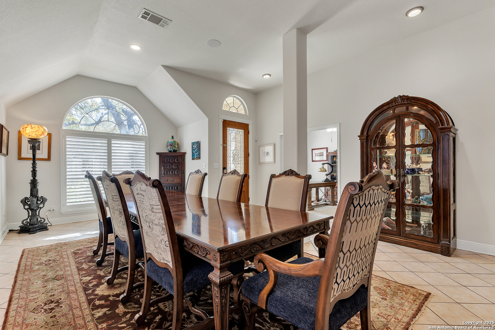 1735 Diamond Ridge San Antonio, TX 78248 - Photo 4 of 33 a view of a dining room with furniture and a large window