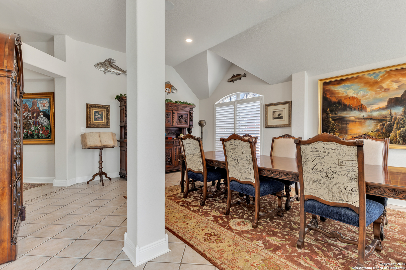 1735 Diamond Ridge San Antonio, TX 78248 - Photo 5 of 33 a dining room with furniture a rug and a painting
