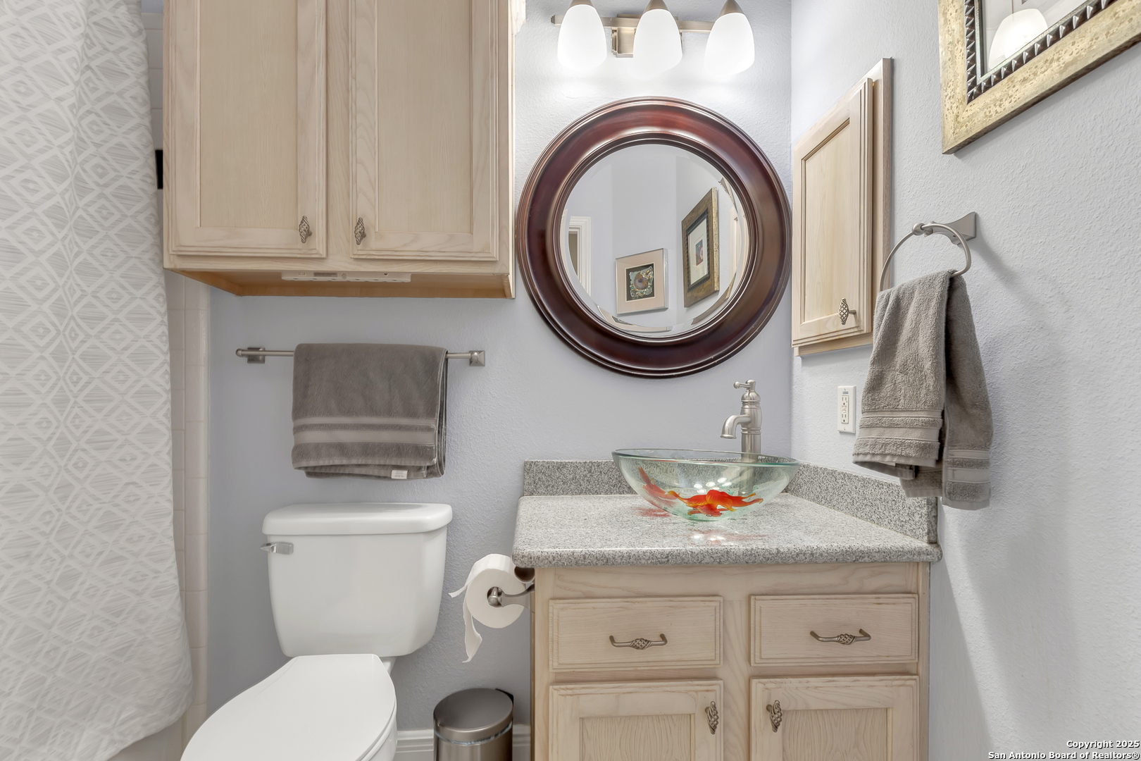 1735 Diamond Ridge San Antonio, TX 78248 - Photo 8 of 33 a bathroom with a sink a toilet and a mirror