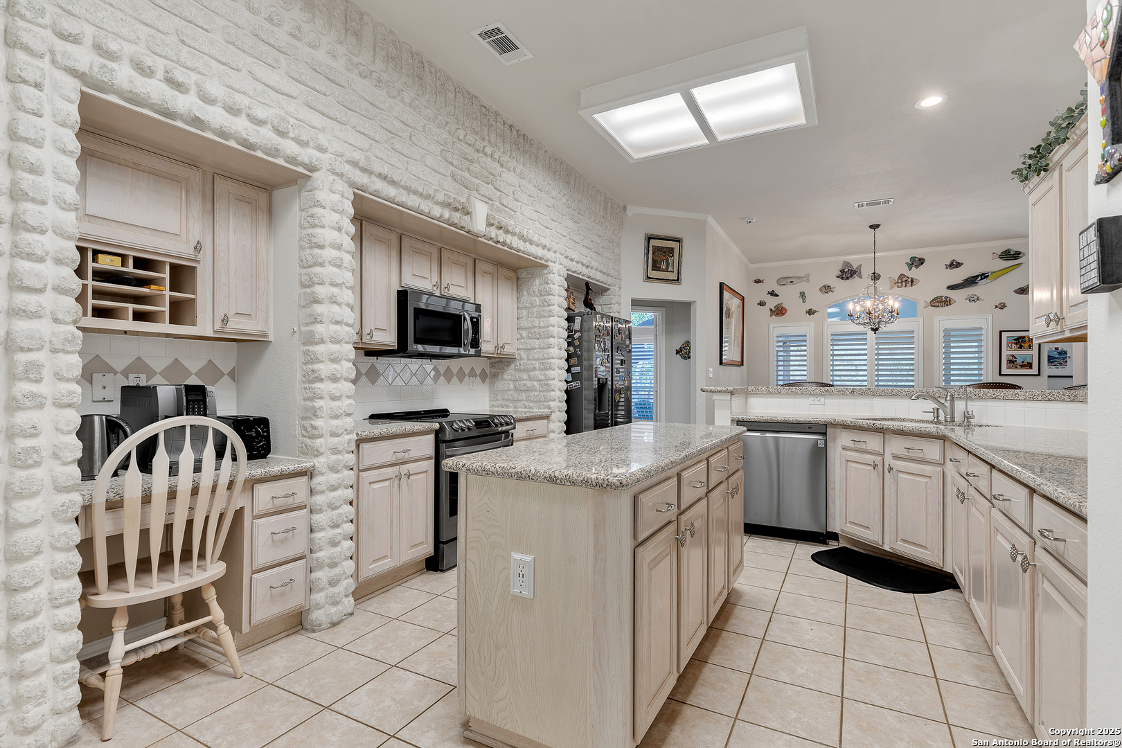 1735 Diamond Ridge San Antonio, TX 78248 - Photo 10 of 33 a kitchen with a sink and a stove top oven with wooden floor