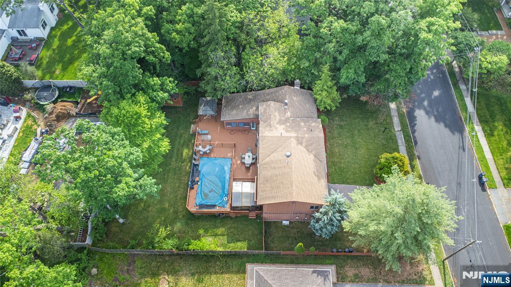 12 Abbott Road Wayne, NJ 07470 - Photo 47 of 49 an aerial view of a house with a yard swimming pool and outdoor seating