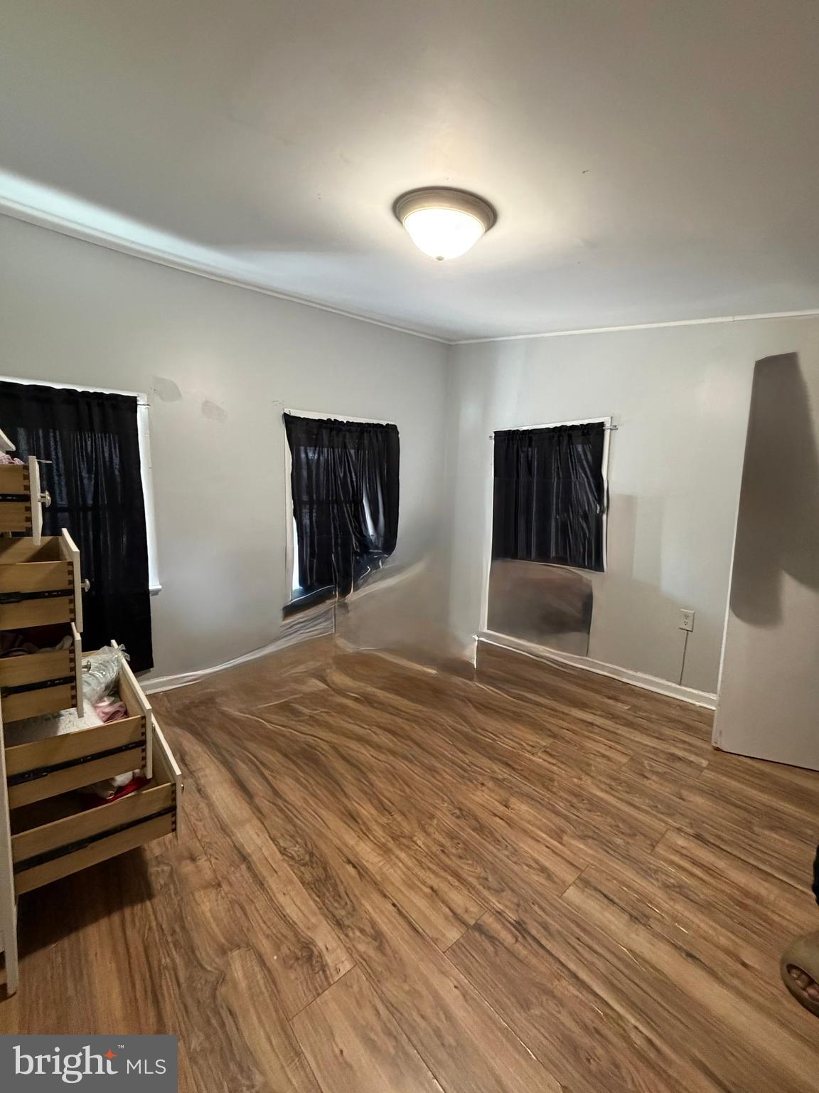 526 South 11th Street Reading, PA 19602 - Photo 16 of 22 a bedroom with a bed and a flat screen tv