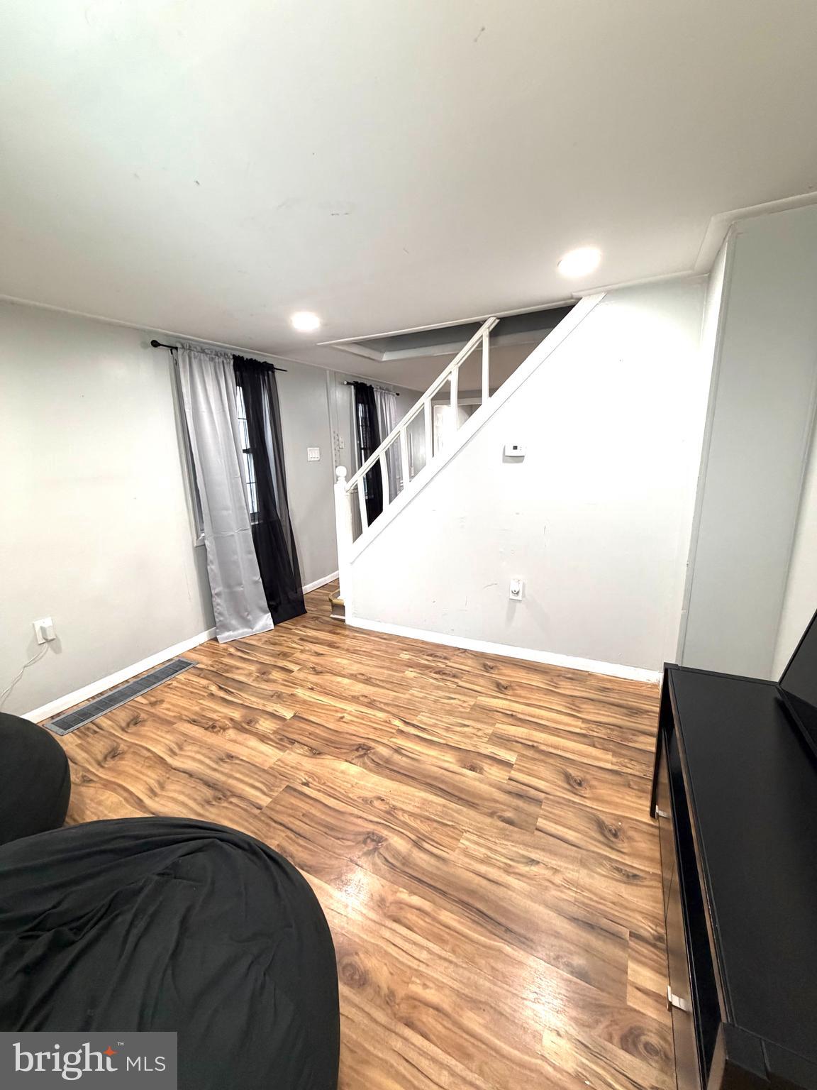 526 South 11th Street Reading, PA 19602 - Photo 3 of 22 a view of a big room with closet and wooden floor