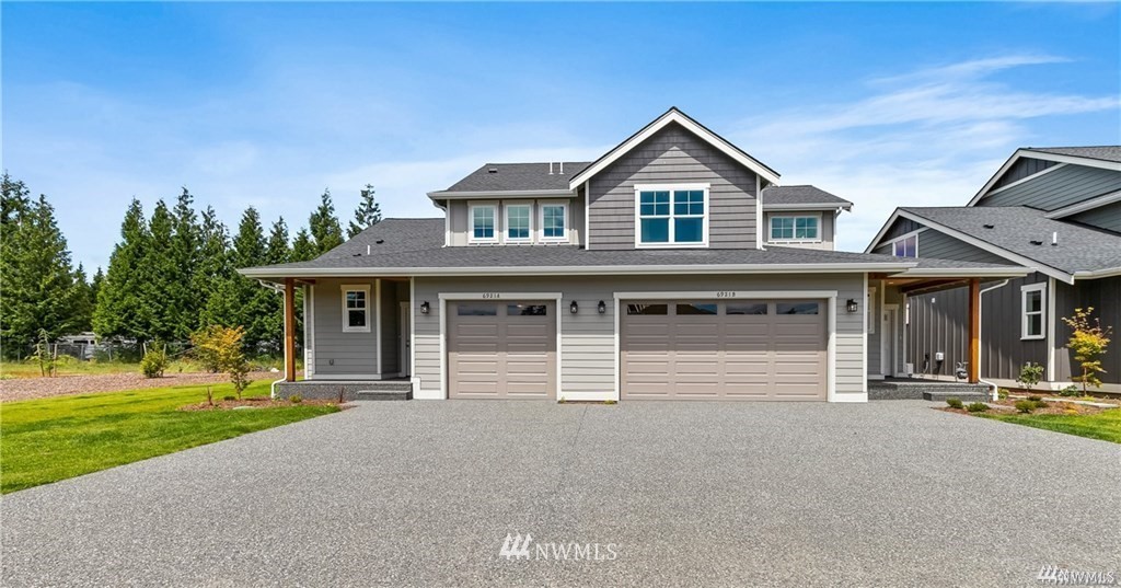 6902 Red Ridge Drive, Unit A Lynden, WA 98264 - Photo 1 of 31 a front view of a house with a yard