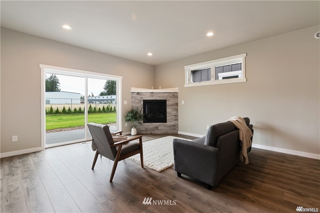 6902 Red Ridge Drive, Unit A Lynden, WA 98264 - Photo 12 of 31 a living room with furniture and a garden