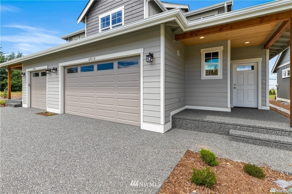 6902 Red Ridge Drive, Unit A Lynden, WA 98264 - Photo 3 of 31 a view of a house with a patio