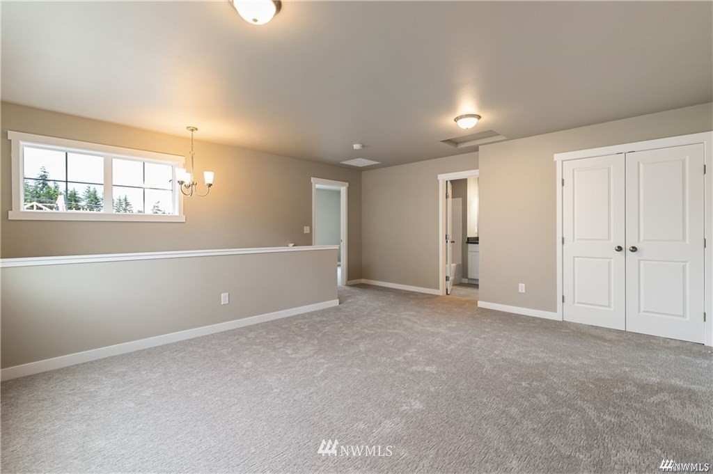 6902 Red Ridge Drive, Unit A Lynden, WA 98264 - Photo 22 of 31 an empty room with windows