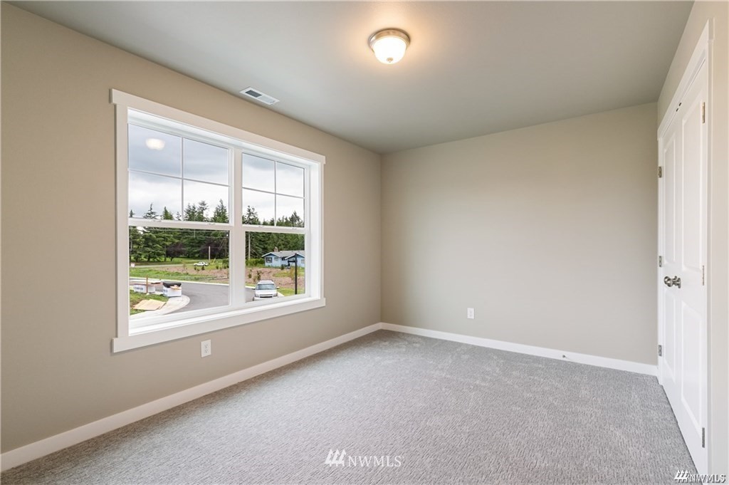 6902 Red Ridge Drive, Unit A Lynden, WA 98264 - Photo 23 of 31 an empty room with windows