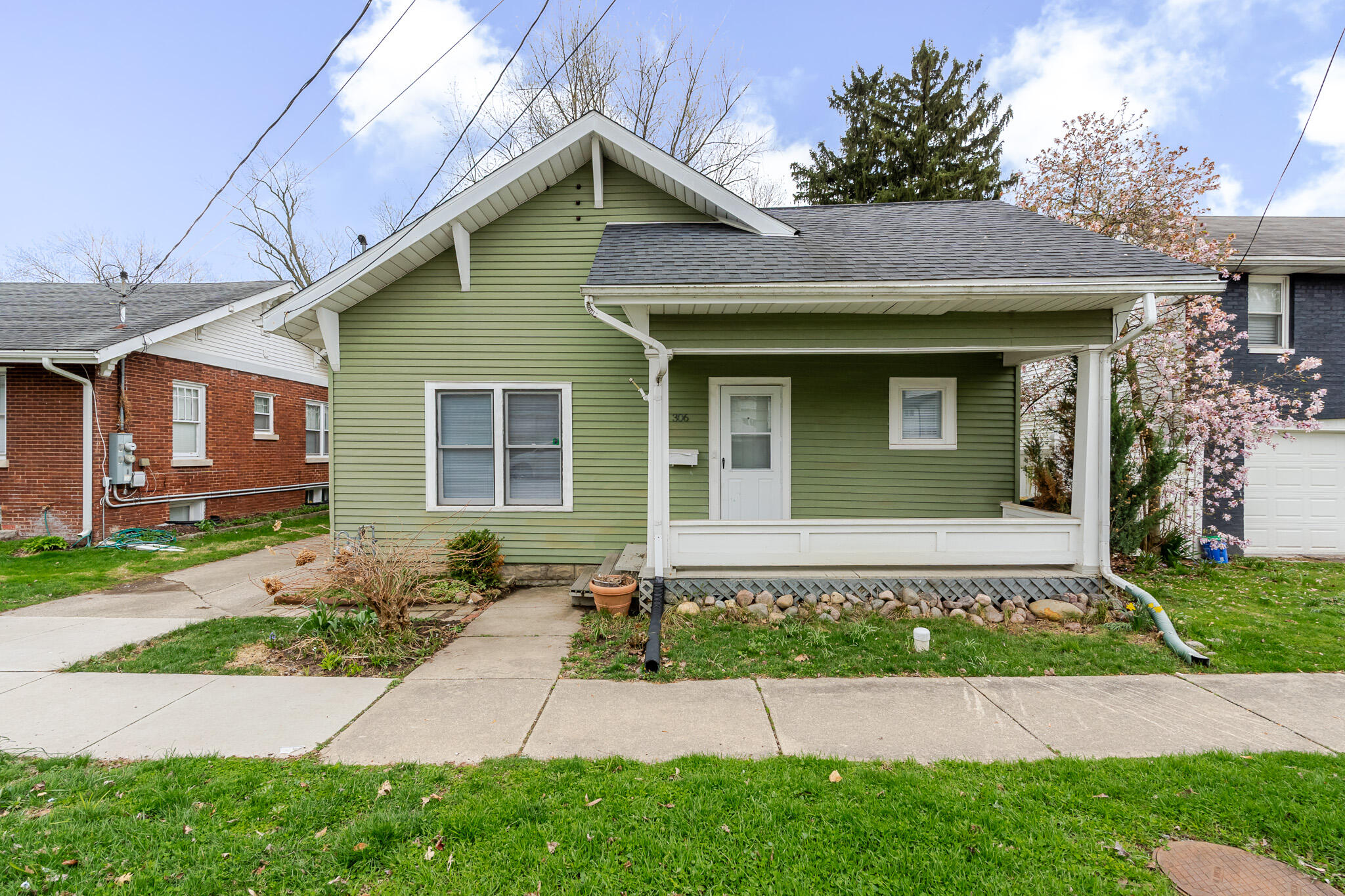 306 Brown Street Valparaiso, IN 46383 - Photo 2 of 19 a front view of a house with garden