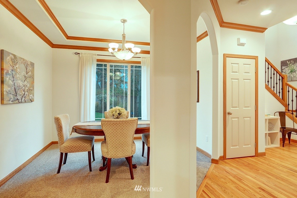 105 182nd Place Southwest, Unit B Bothell, WA 98012 - Photo 5 of 25 a dining room with furniture and window
