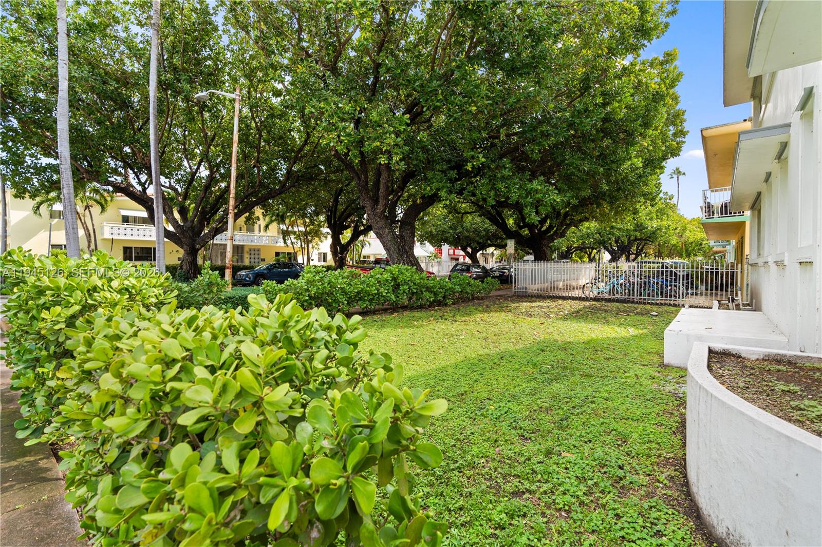 810 7th Street, Unit 102 Miami Beach, FL 33139 - Photo 17 of 21 a garden view with a fountain