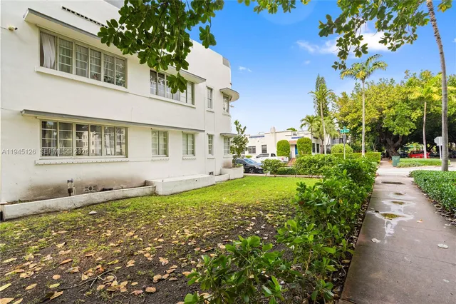 a house view with a garden space