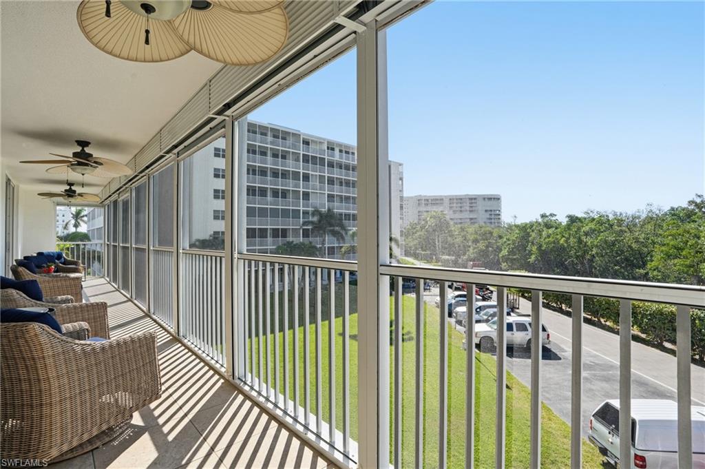 5 Bluebill Avenue, Unit 301 Naples, FL 34108 - Photo 31 of 48 a view of balcony with furniture