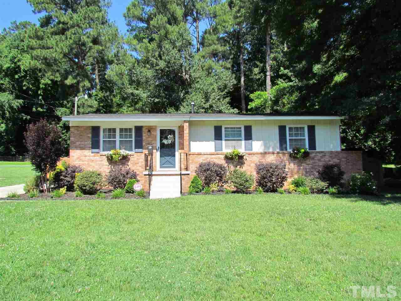 1217 Somerset Road Raleigh, NC 27610 - Photo 1 of 29 a front view of house with yard and green space