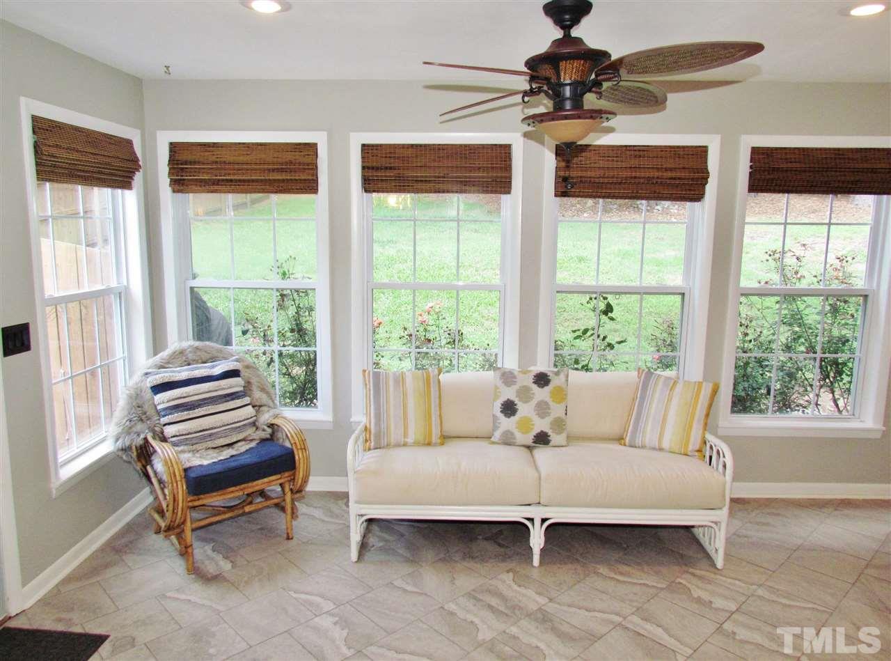 1217 Somerset Road Raleigh, NC 27610 - Photo 22 of 29 a bedroom with furniture and windows