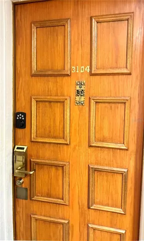 a view of a storage & utility room with two washing machine