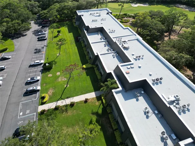 a view of a chairs and table in the patio