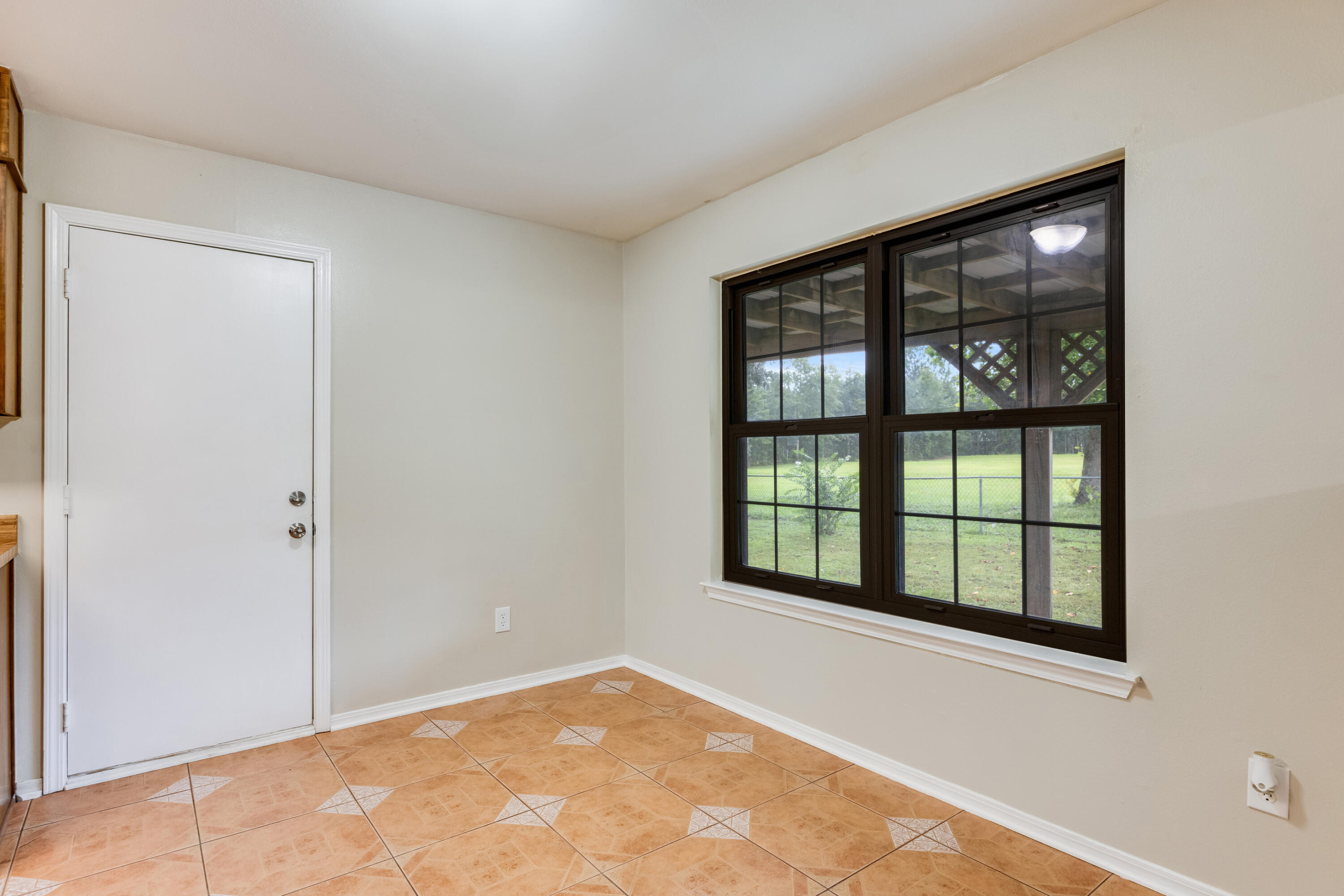 5892 Jack Stokes Road Baker, FL 32531 - Photo 20 of 49 an empty room with window