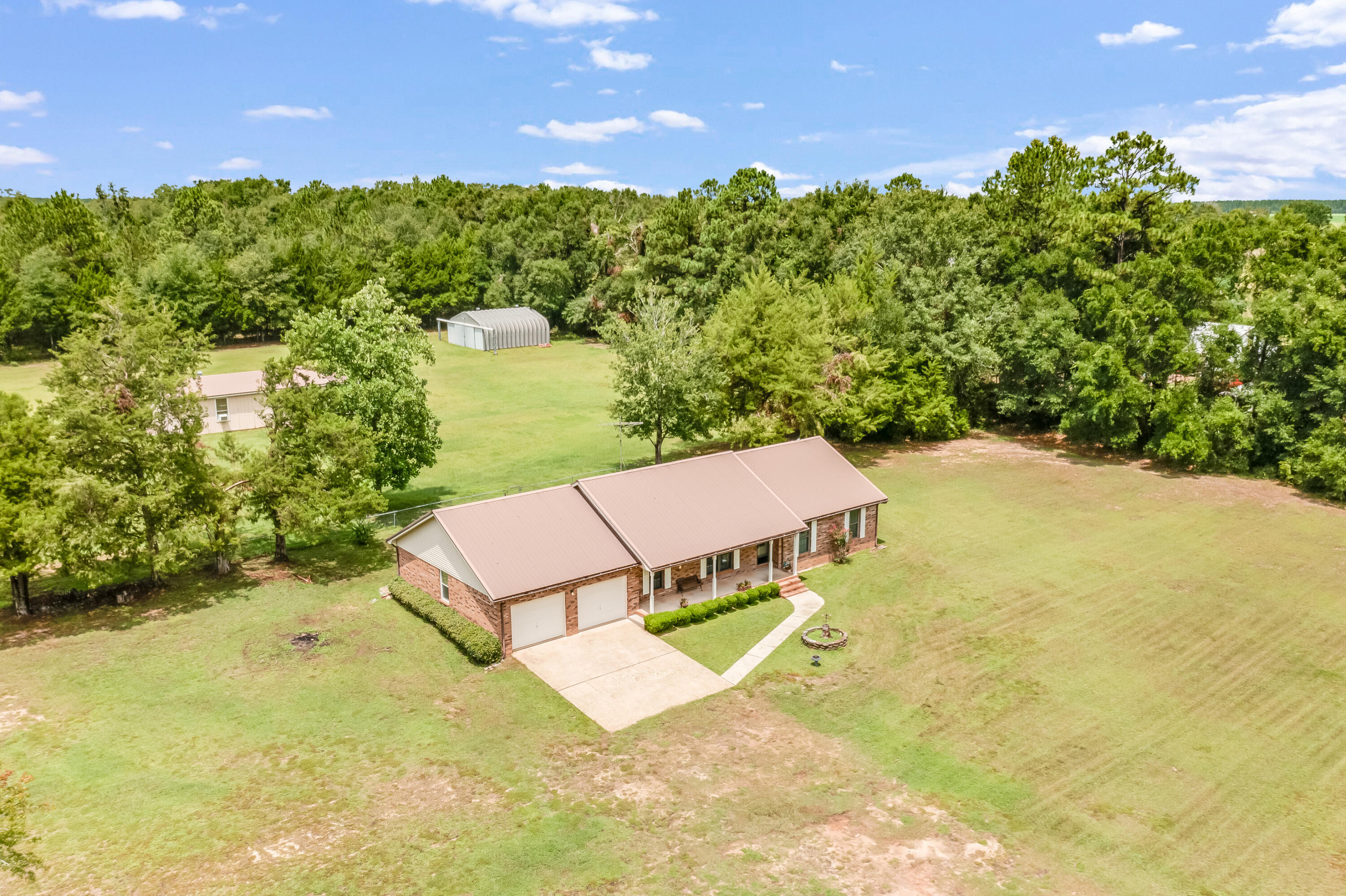 5892 Jack Stokes Road Baker, FL 32531 - Photo 35 of 49 a view of a tennis court