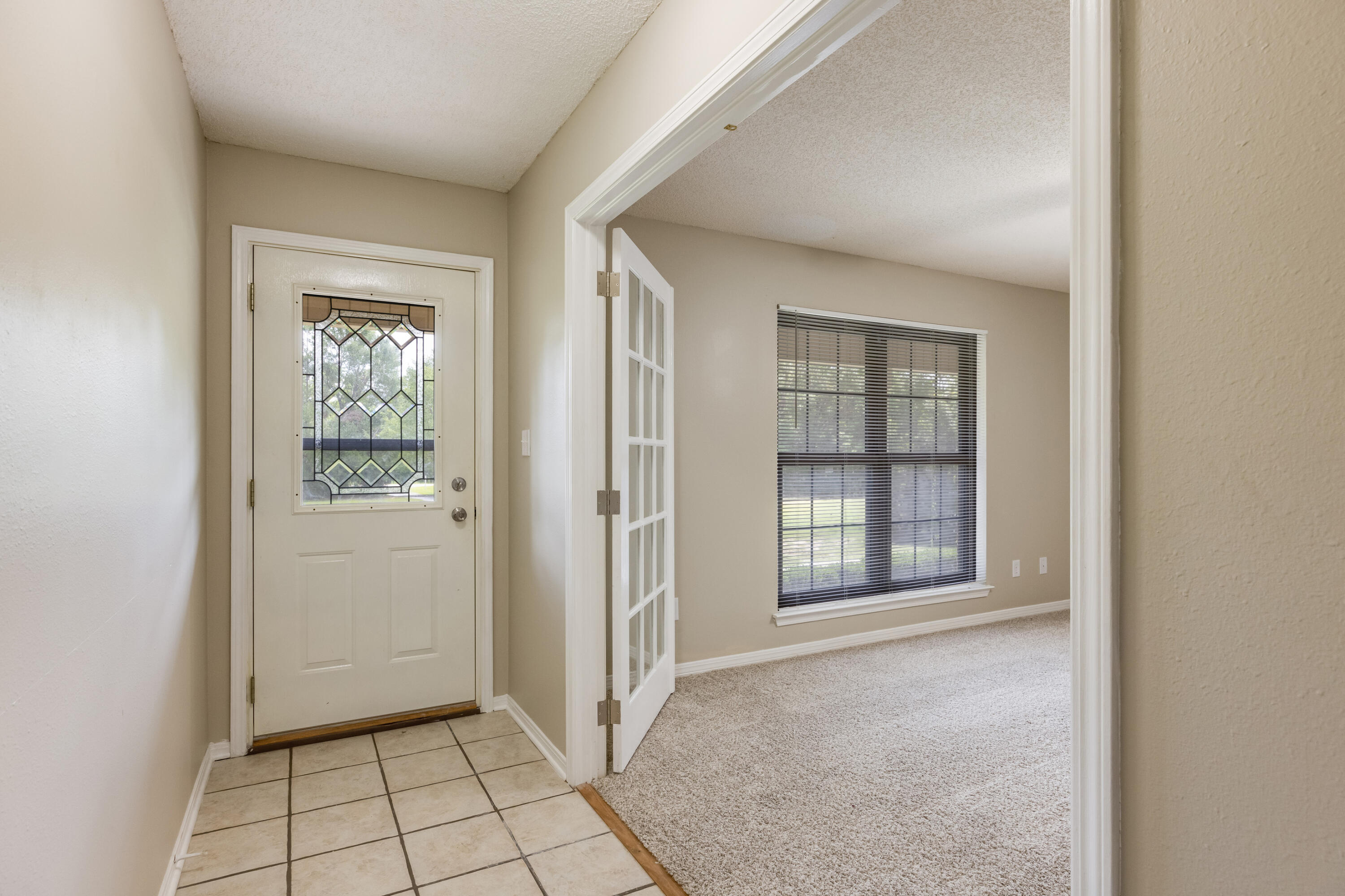 5892 Jack Stokes Road Baker, FL 32531 - Photo 4 of 49 a view of an empty room with window