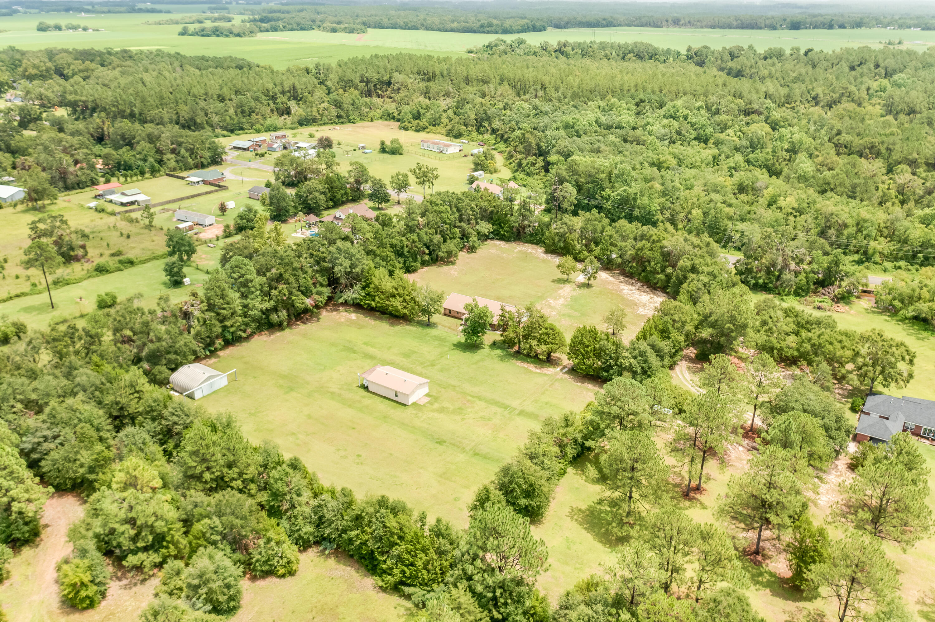 5892 Jack Stokes Road Baker, FL 32531 - Photo 48 of 49 a view of a yard with an outdoor space