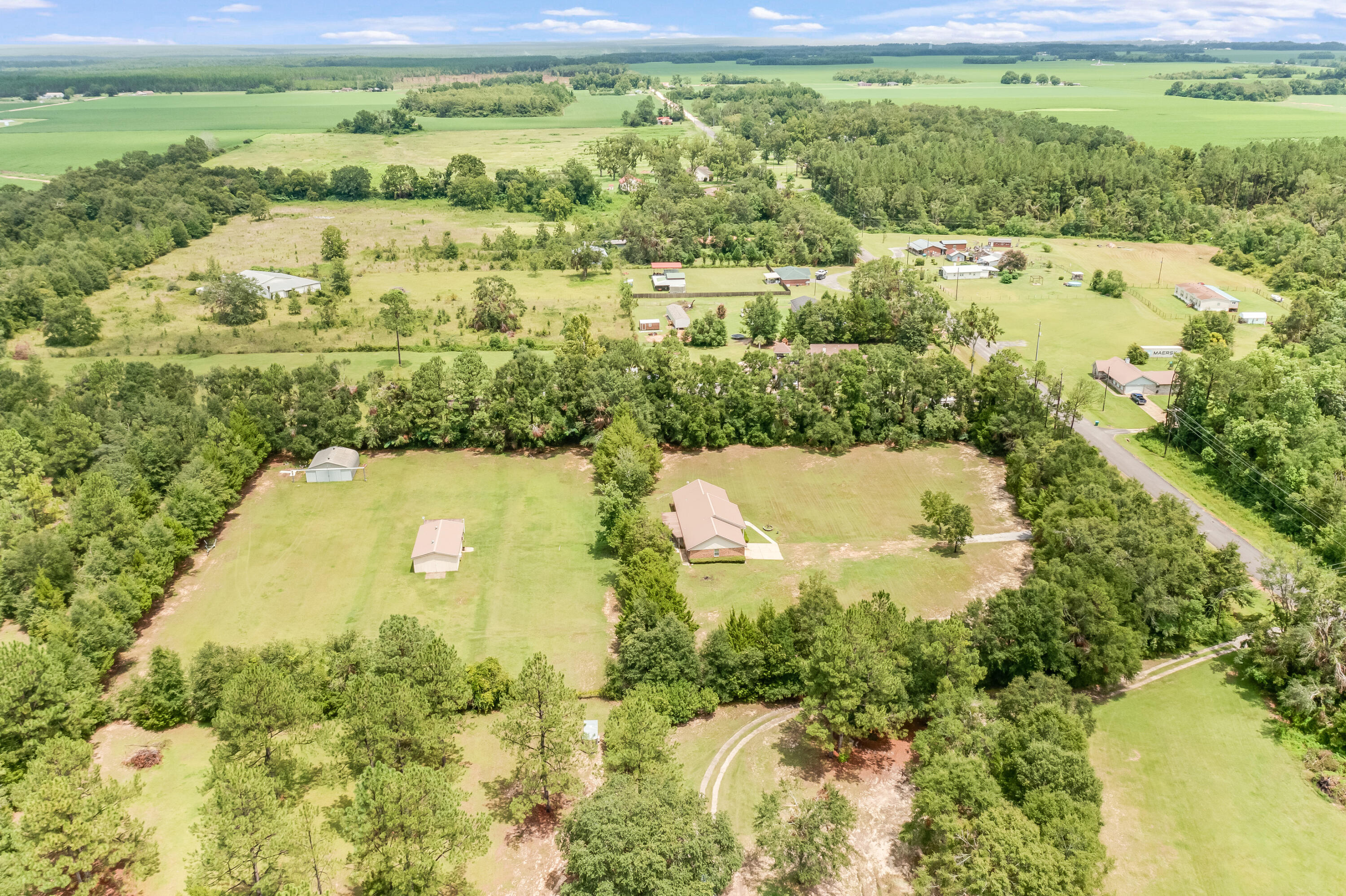 5892 Jack Stokes Road Baker, FL 32531 - Photo 49 of 49 a view of a lake with a yard