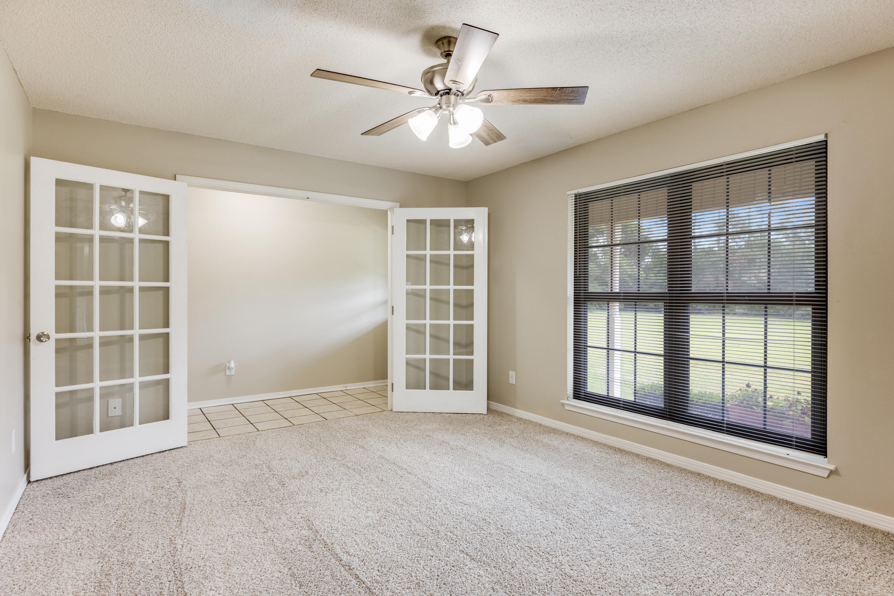 5892 Jack Stokes Road Baker, FL 32531 - Photo 7 of 49 a view of an empty room with a window