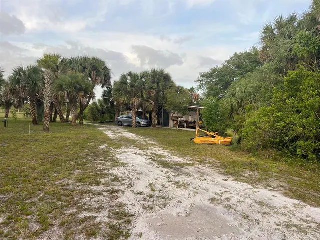 a view of a yard with a fountain