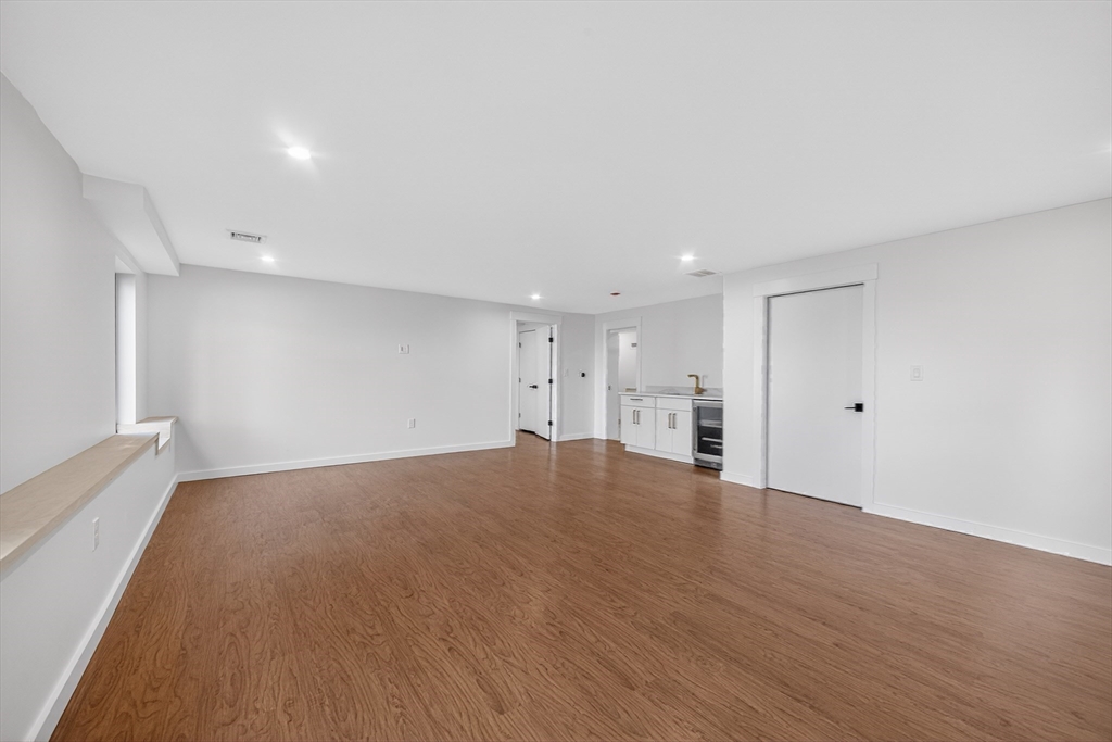 15 Bird Hill Road Lexington, MA 02421 - Photo 29 of 34 a view of empty room with wooden floor