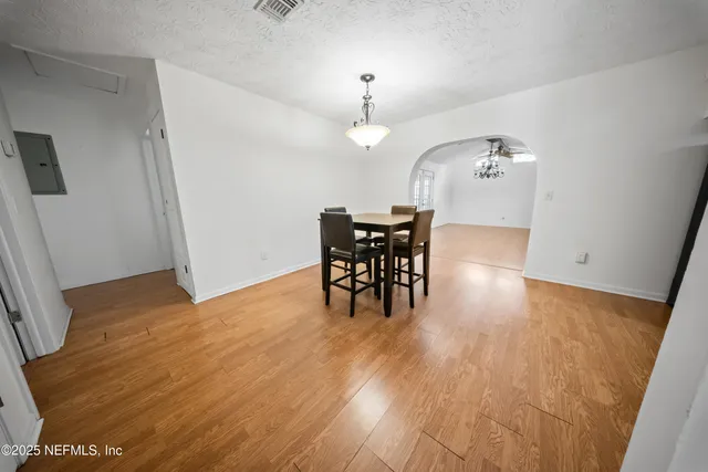 a view of a dining room with furniture