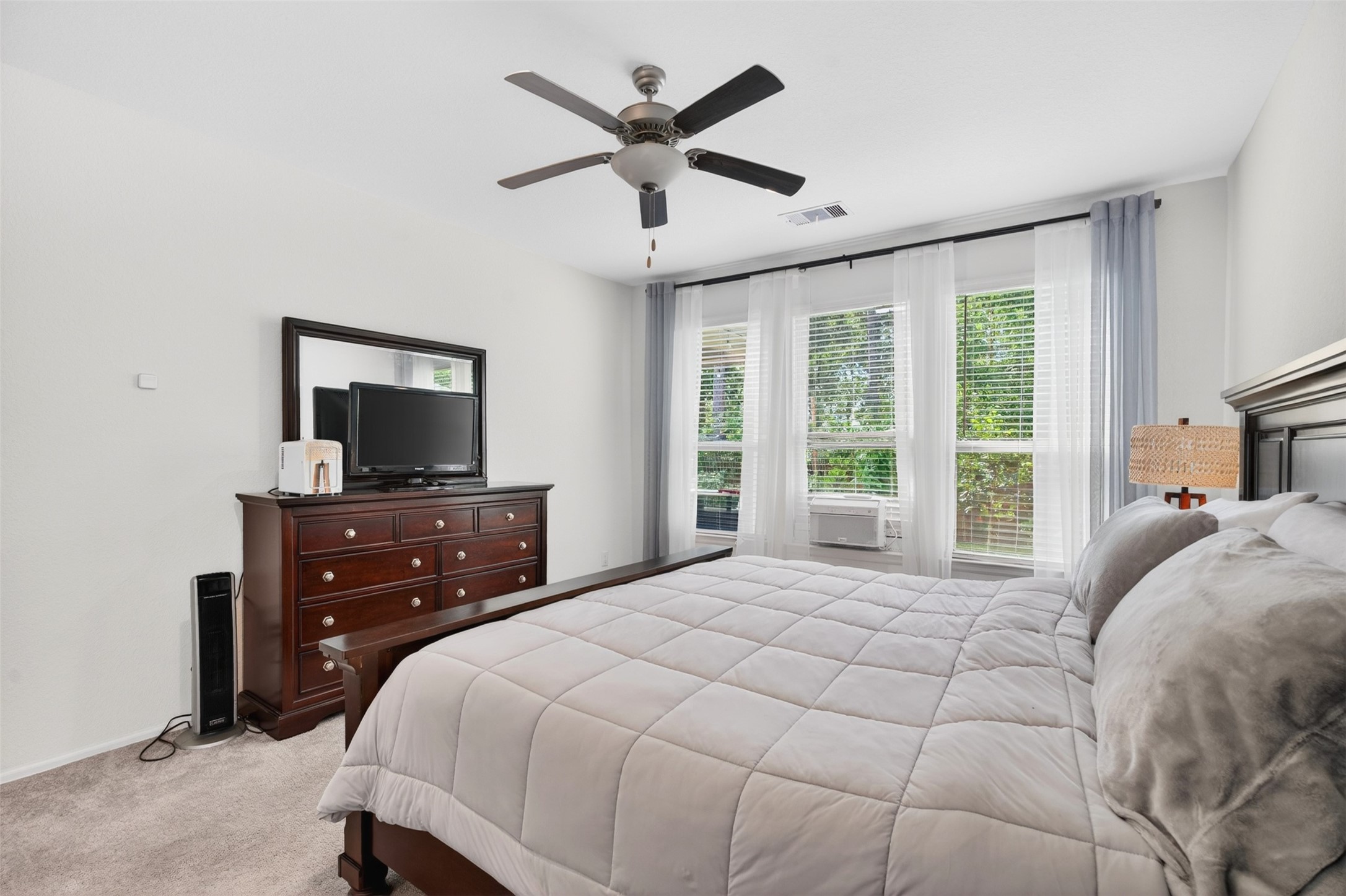 2832 Mistygate Court Conroe, TX 77301 - Photo 16 of 50 Another view of the spacious primary bedroom.