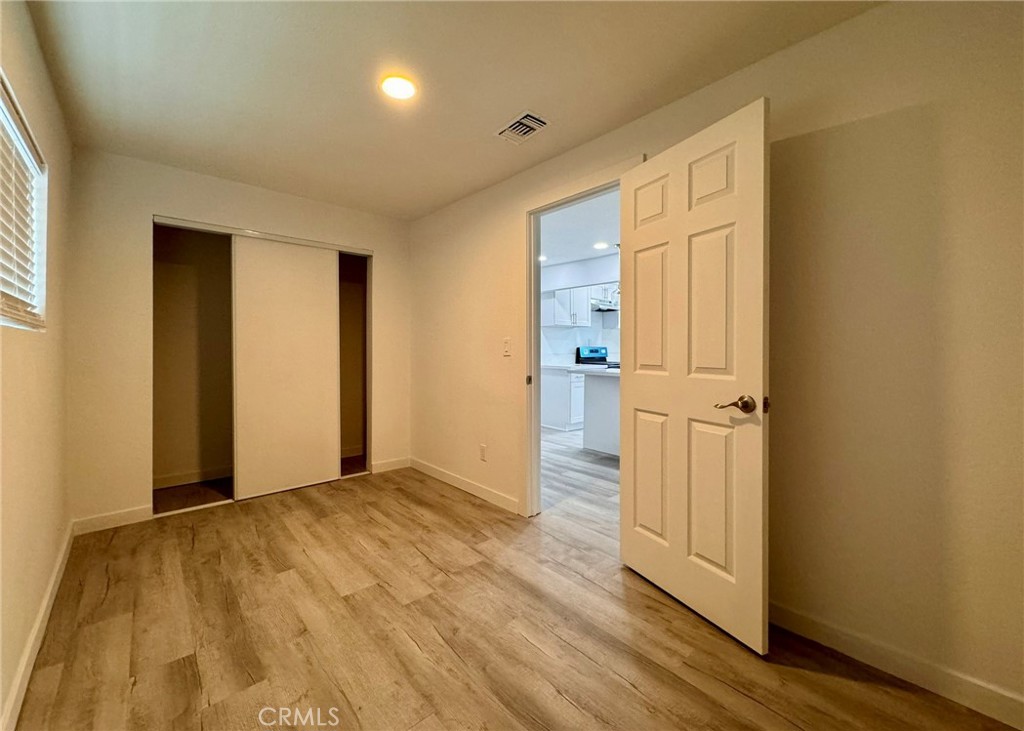 1362 South Downey Road Los Angeles, CA 90023 - Photo 17 of 30 a view of empty room with wooden floor