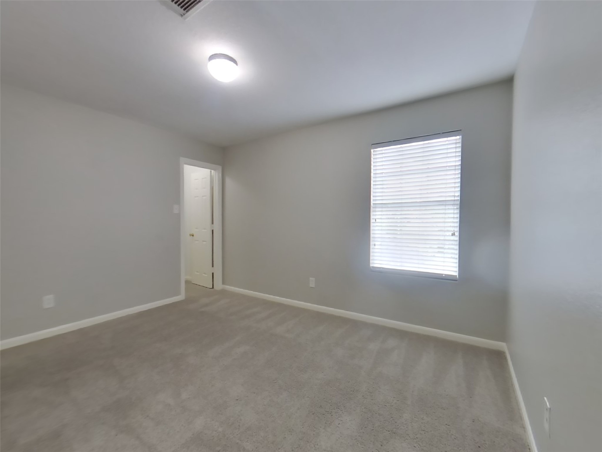 19626 Beachy Court Katy, TX 77449 - Photo 13 of 19 an empty room with a window