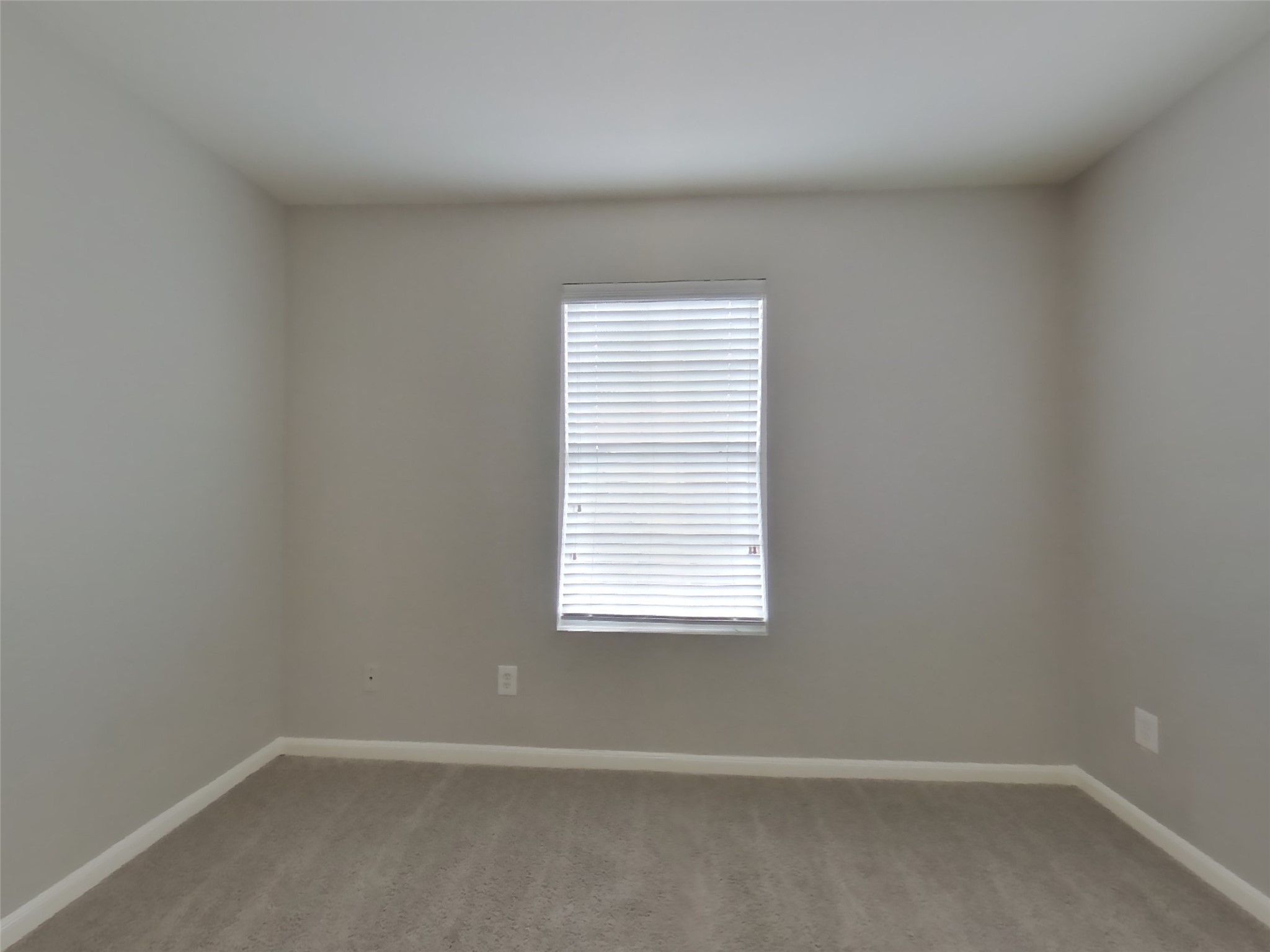 19626 Beachy Court Katy, TX 77449 - Photo 18 of 19 an empty room with a window