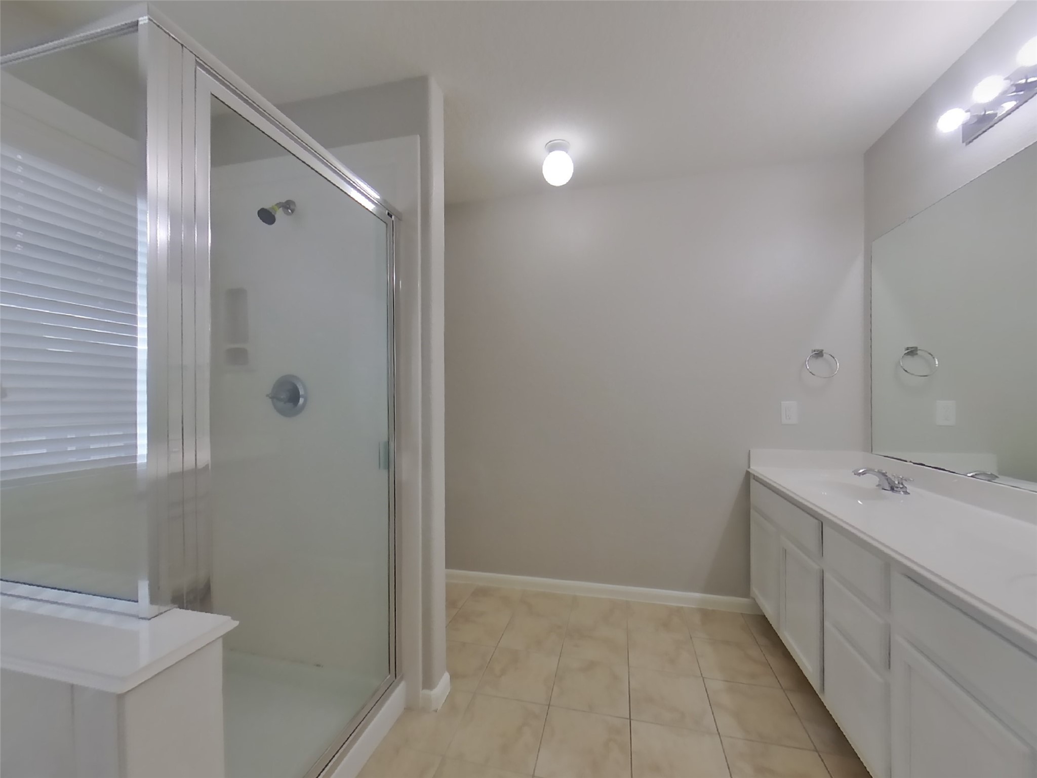 19626 Beachy Court Katy, TX 77449 - Photo 10 of 19 a bathroom with a double vanity sink and mirror