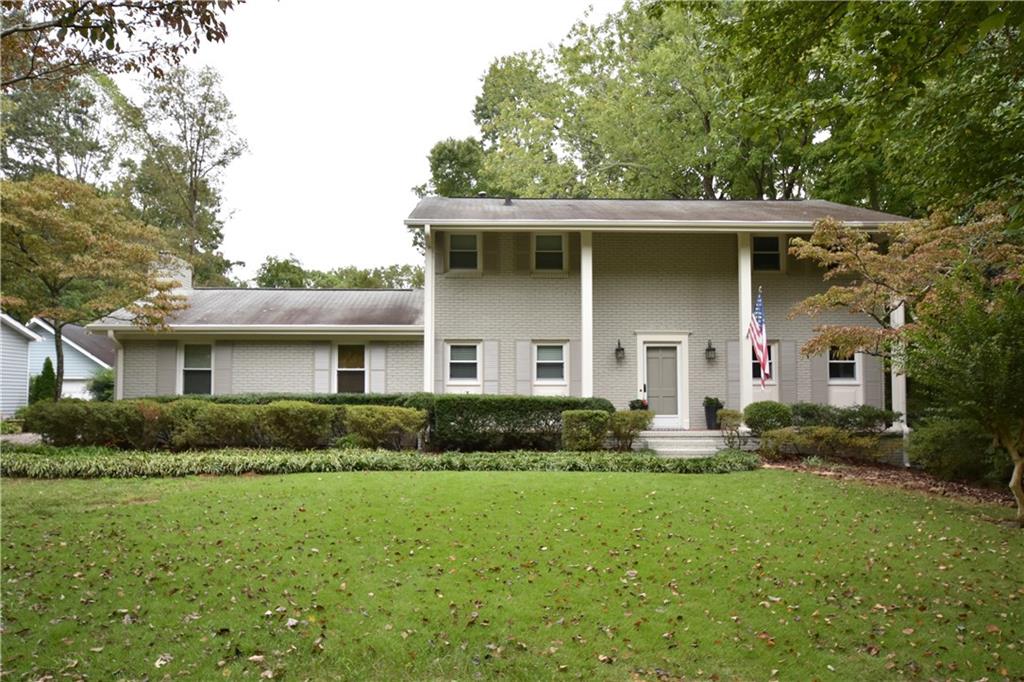 1551 Runnymeade Road Northeast Brookhaven, GA 30319 - Photo 1 of 1 Recent facelift on this 2 story Sexton Woods home.
