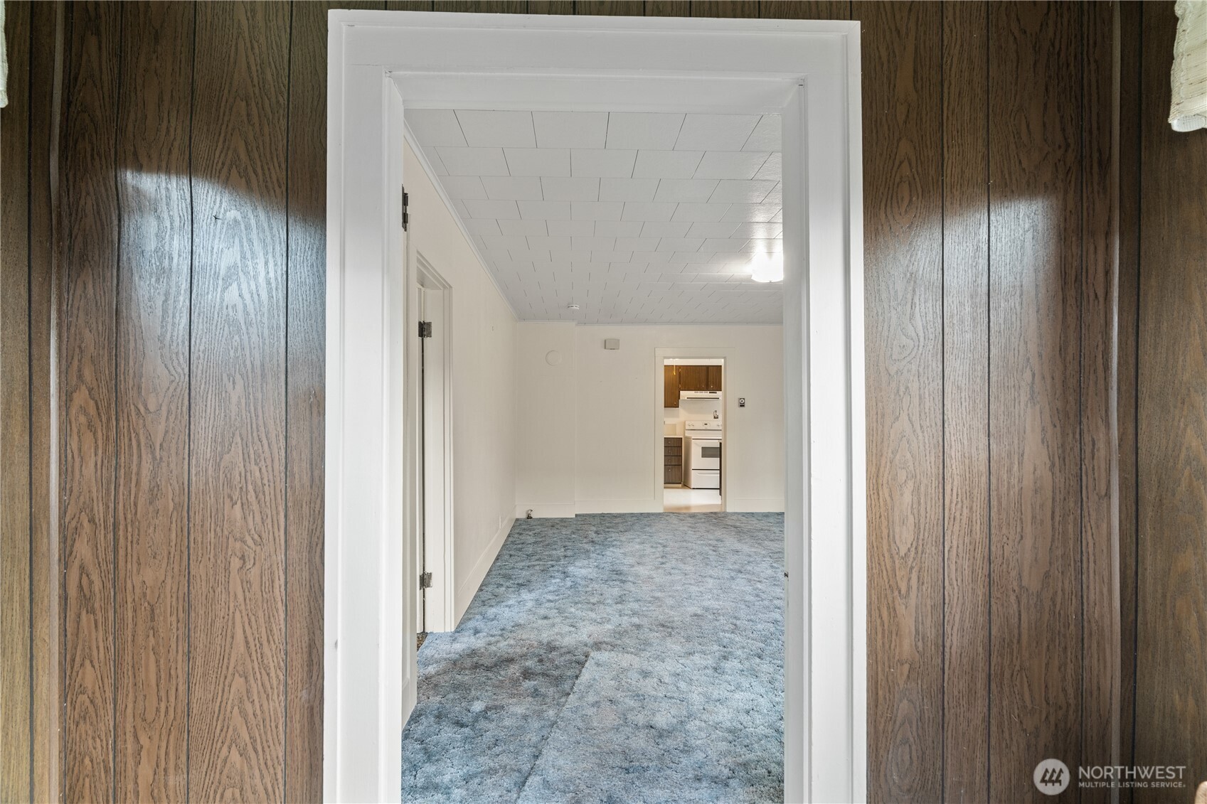 324 North F Street Aberdeen, WA 98520 - Photo 4 of 32 a view of a hallway with wooden floor