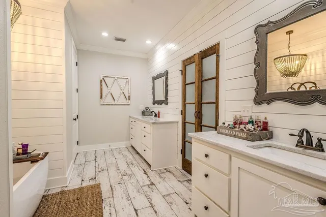 a view of a bathtub in a bathroom