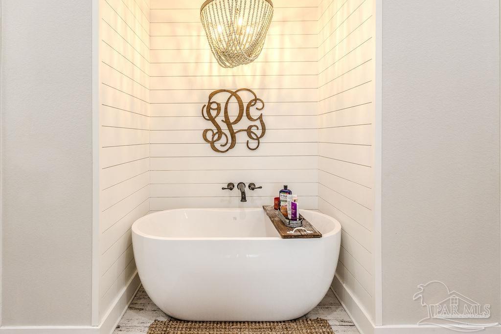 778 Griswold Road Jay, FL 32565 - Photo 21 of 57 a view of a bathtub in a bathroom