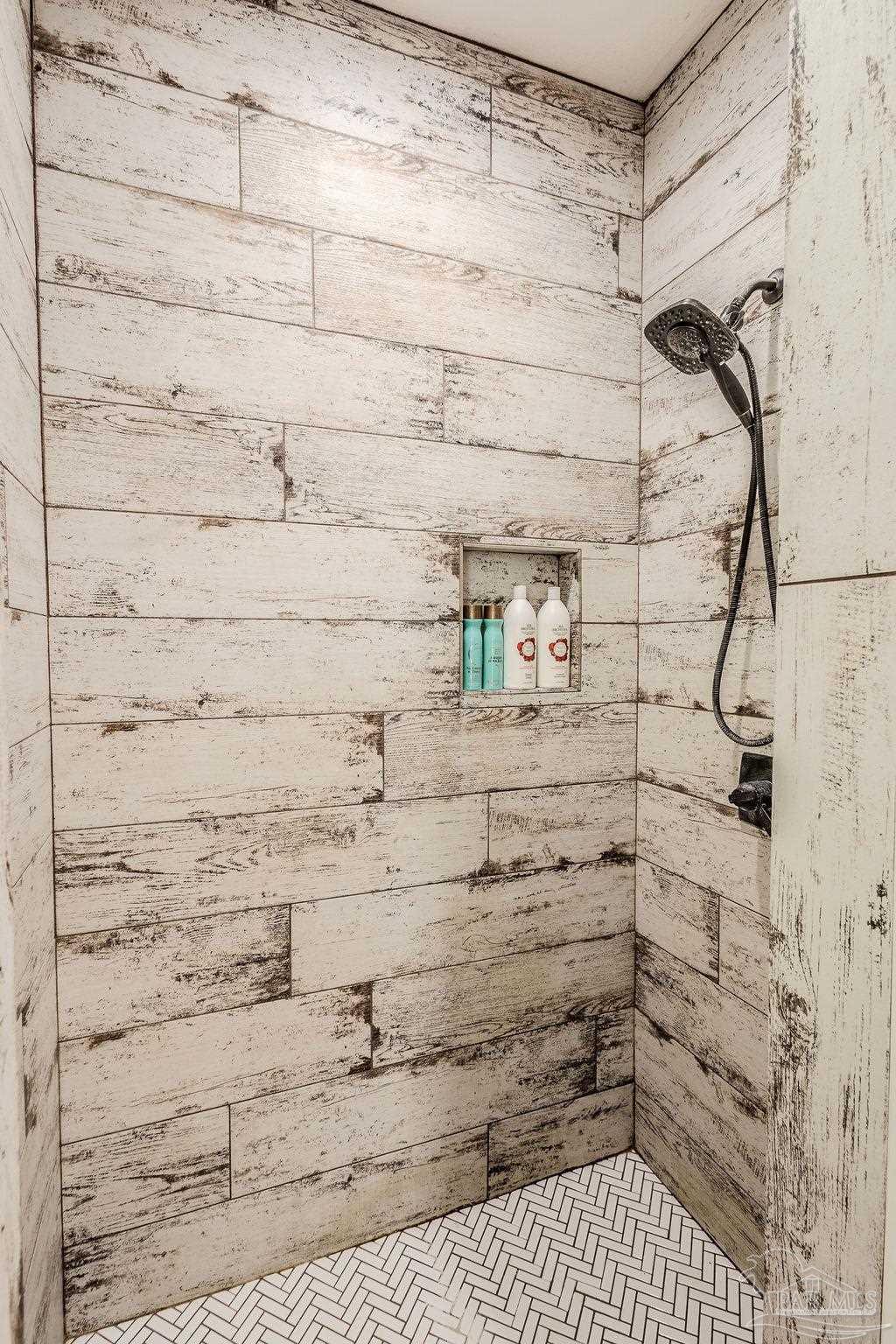 778 Griswold Road Jay, FL 32565 - Photo 22 of 57 a bathroom with a shower