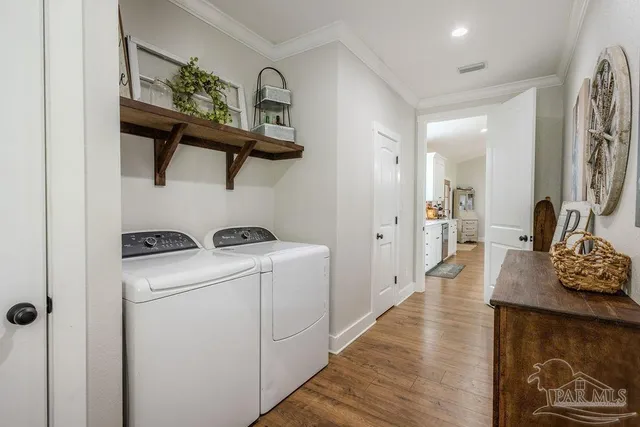 a living room with patio furniture and a floor to ceiling window
