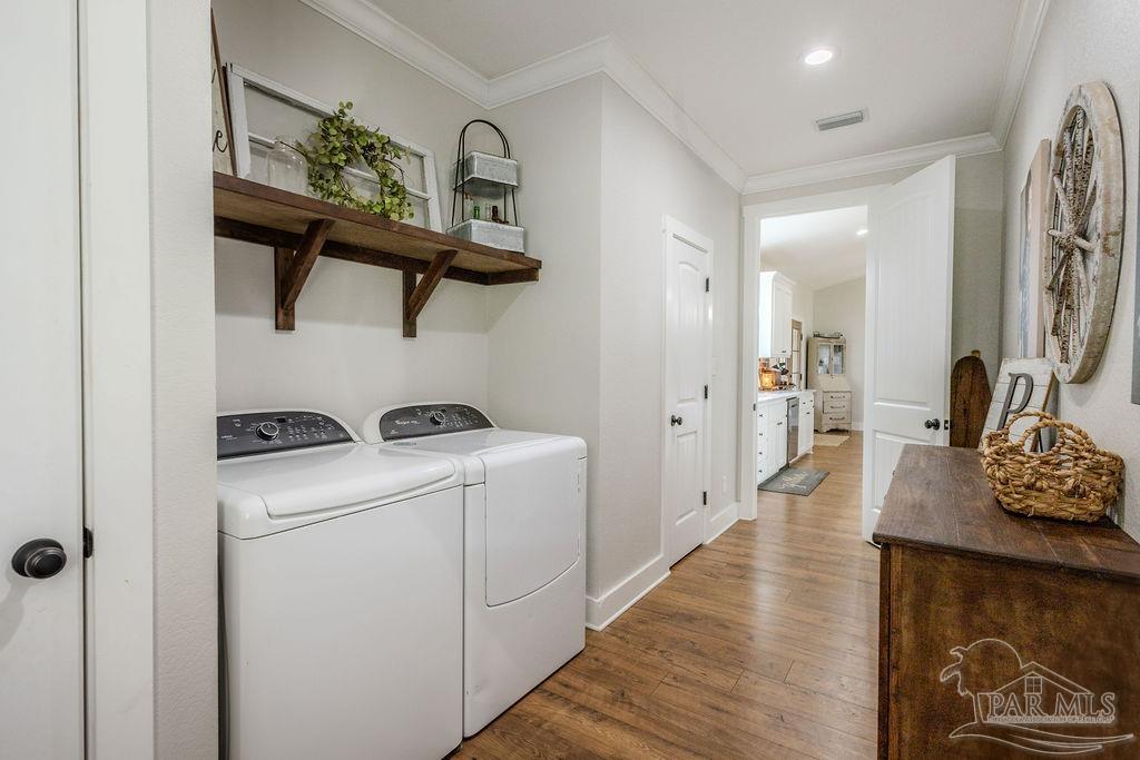 778 Griswold Road Jay, FL 32565 - Photo 29 of 57 a room with storage and utility