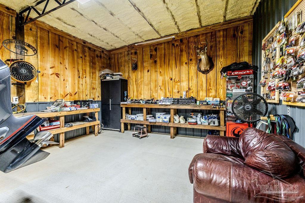 778 Griswold Road Jay, FL 32565 - Photo 38 of 57 a view of living room with furniture and chandelier