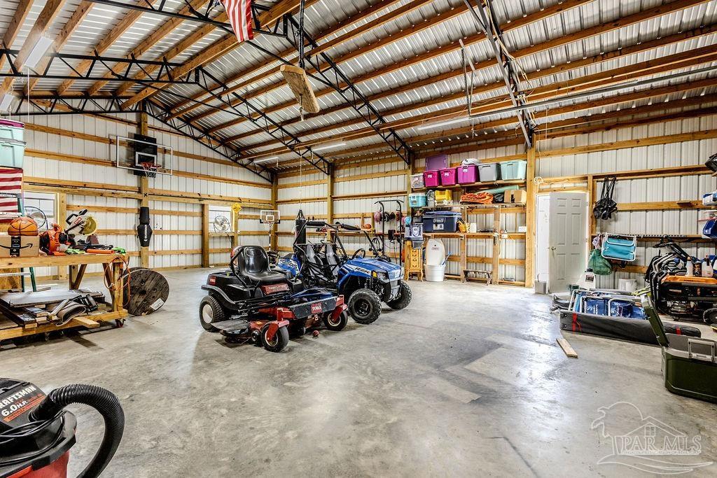 778 Griswold Road Jay, FL 32565 - Photo 40 of 57 a view of a room with gym equipment