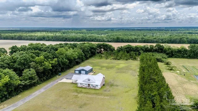 a view of a lake with a yard