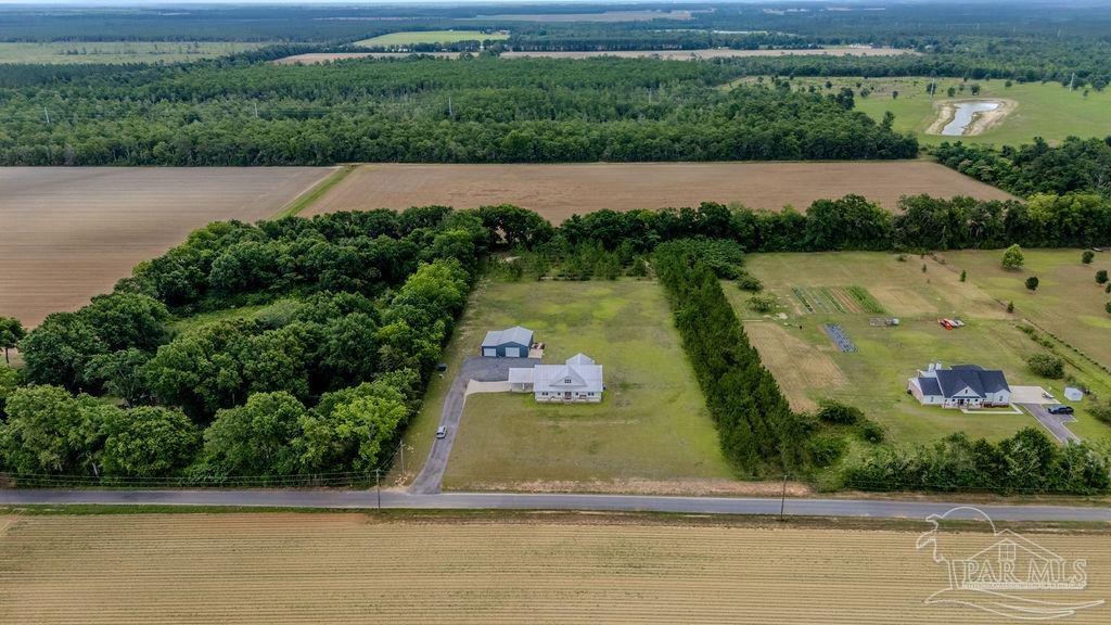 778 Griswold Road Jay, FL 32565 - Photo 45 of 57 a view of swimming pool with a yard