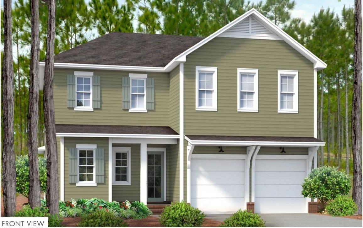 22 Roundwood Drive, Unit LOT 294 Watersound, FL 32461 - Photo 1 of 32 a front view of a house with a yard