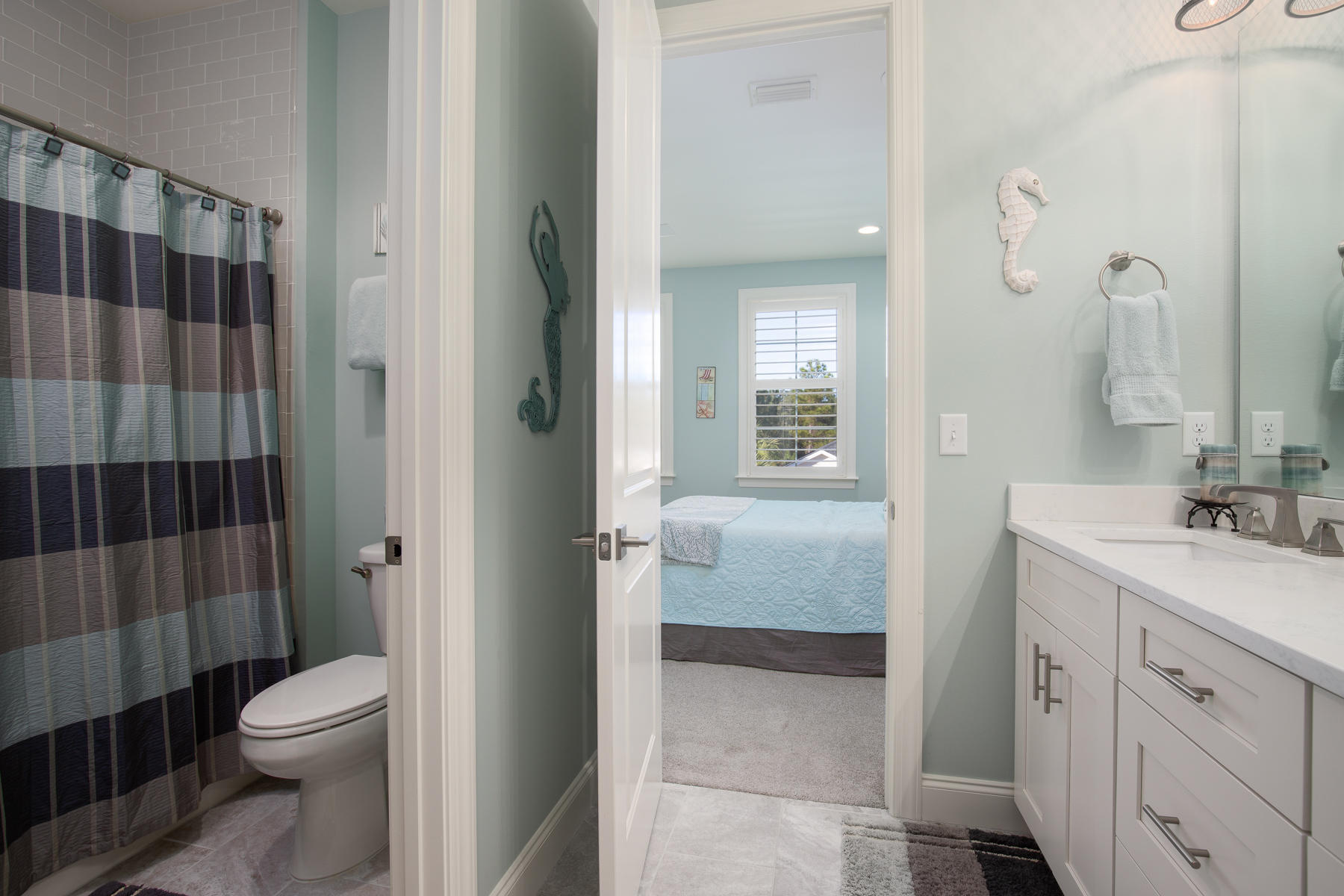 22 Roundwood Drive, Unit LOT 294 Watersound, FL 32461 - Photo 16 of 32 a bathroom with a sink a toilet and shower