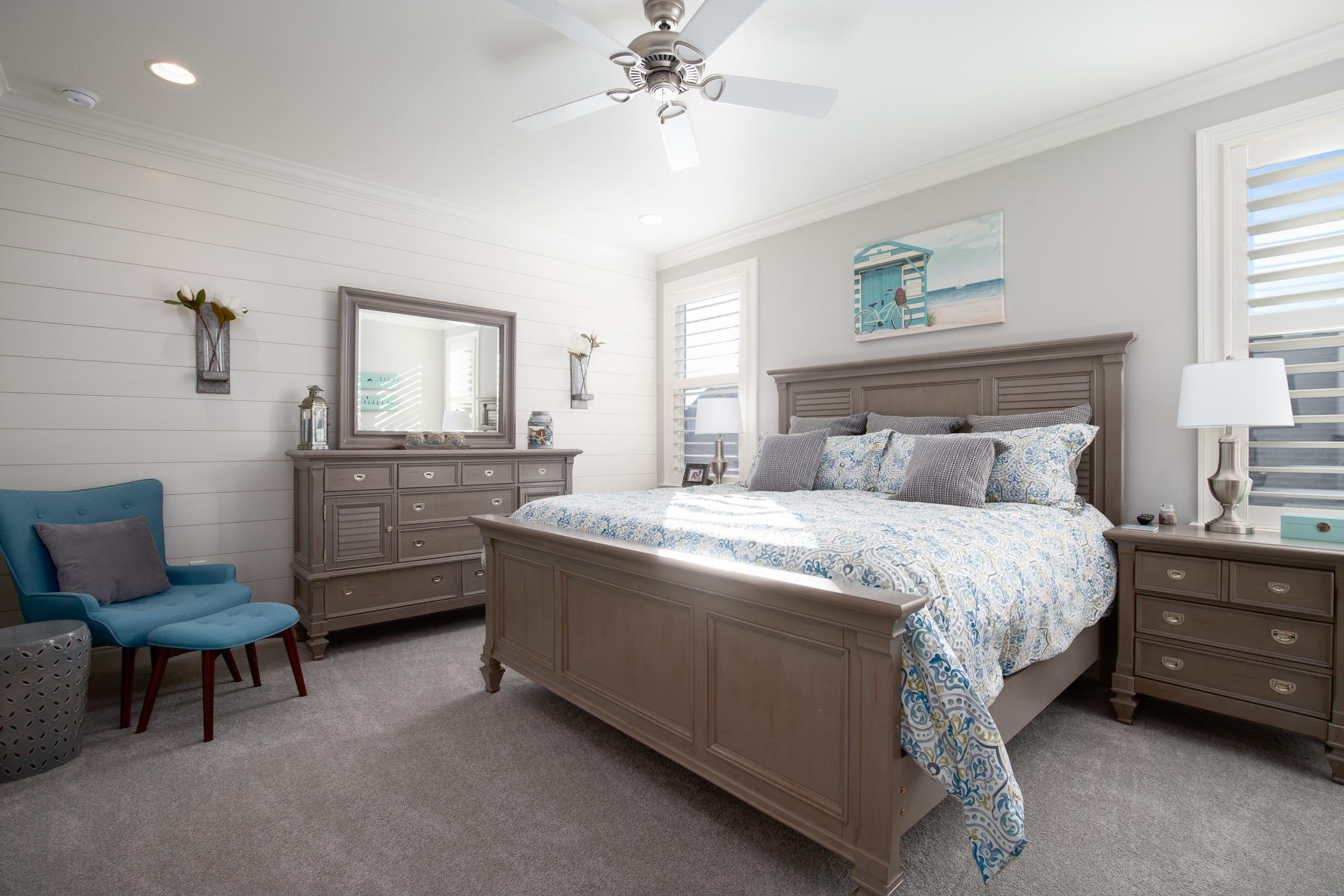 22 Roundwood Drive, Unit LOT 294 Watersound, FL 32461 - Photo 20 of 32 a bedroom with a bed and a chair